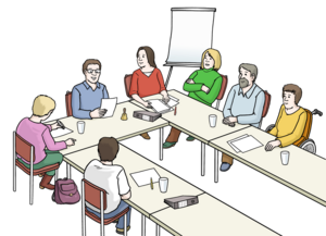 Bild vergrößern: Das Bild zeigt eine Arbeitsgruppe. Mehrere Menschen sitzen um einen Tisch herum und reden miteinander. Vor den Personen liegen Zettel auf dem Tisch. Eine Person schreibt gerade etwas auf.